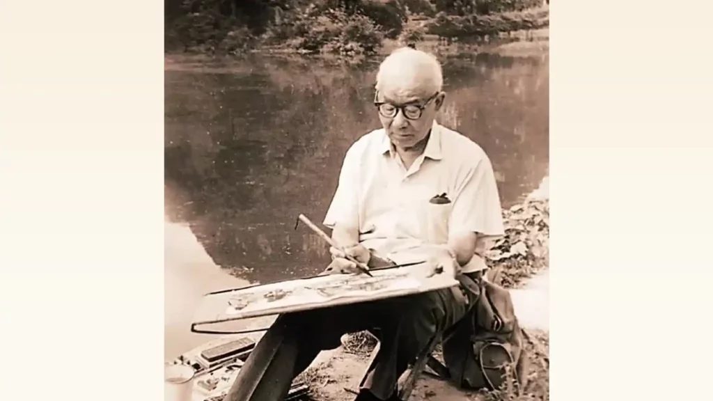 李可染在水邊作畫