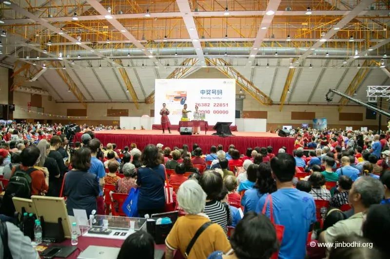 Participants reacting during the lucky draw