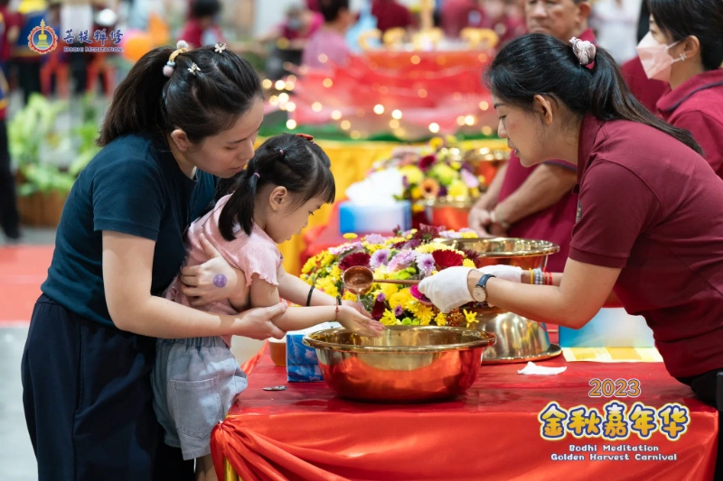 Handwashing in a golden basin