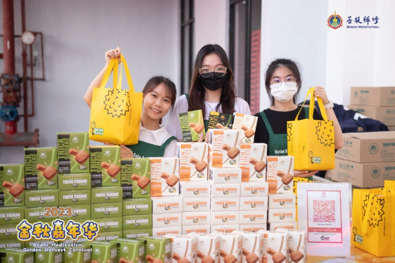 Booth operators with their food items