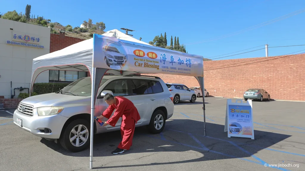 A Bodhi Meditation teacher performed vehicle purification for devotees.  