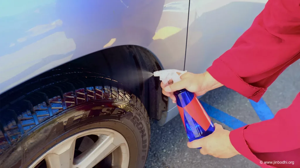 A Bodhi Meditation teacher purified the tires of devotees' vehicles.  