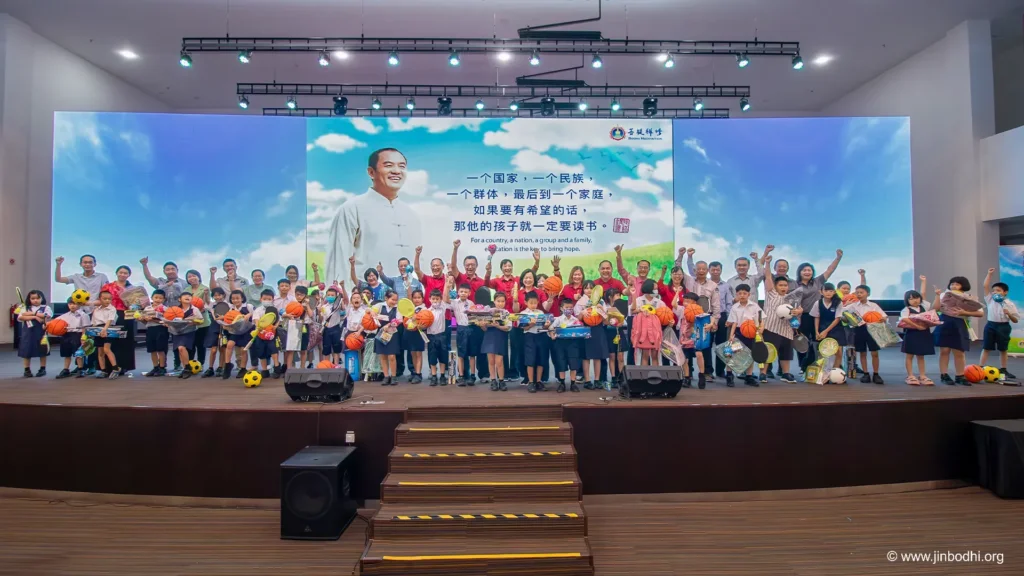 A group photo of the charity donation event during Ullambana in Malaysia.  