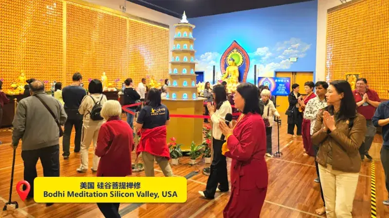 来宾恭敬双手合十,参与祈福与绕佛仪式